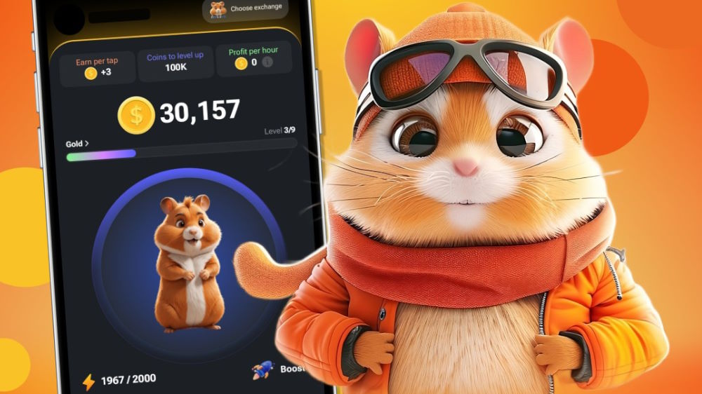 همستر کنار موبایل با بازی همستر کوین